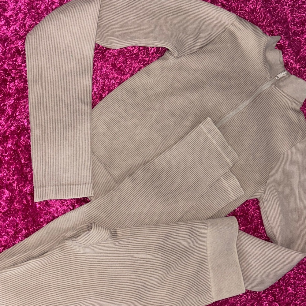 Ribbed Tan Zip-Up Jumpsuit from Pretty Little thing sport 💎